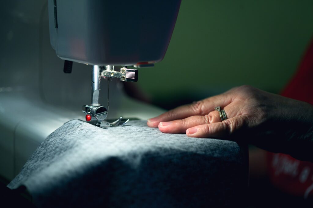 a woman sewing