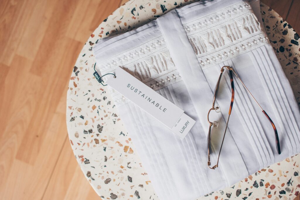 a white shirt with the sustainable label